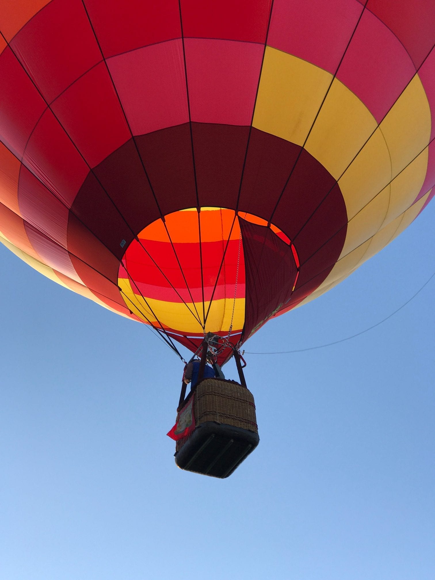 Everything you need to know about attending Albuquerque International Balloon Fiesta, the most photographed event in the world. Tips for photography and pictures to inspire a fall New Mexico road trip. A true Bucket list event -- this hot air balloon festival is both family friendly and amazing for Instagram photographers to capture the colorful glow. #bucketlists #newmexico #nm #albuquerque #usa #states
