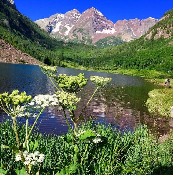 The ultimate Colorado hiking guide for awesome trails with mountains, waterfalls, and epic photography views for beginners to experts to get some of that mountain magic and wanderlust exploring America. Summer pictures and ideas for day trips near Denver, Boulder, Estes Park, Rocky Mountain National Park, and Colorado Springs. Nature, adventure, and beautiful places guaranteed. Because getting outdoors is one of the best things to do in Denver and fun vacation ideas with kids. #colorado #hikes 