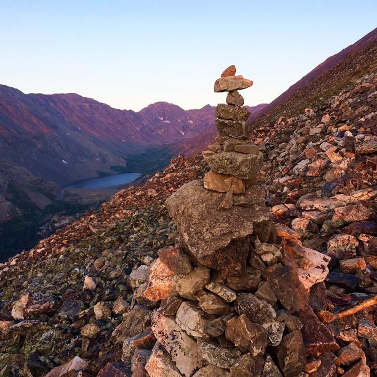 The ultimate Colorado hiking guide for awesome trails with mountains, waterfalls, and epic photography views for beginners to experts to get some of that mountain magic and wanderlust exploring America. Summer pictures and ideas for day trips near Denver, Boulder, Estes Park, Rocky Mountain National Park, and Colorado Springs. Nature, adventure, and beautiful places guaranteed. Because getting outdoors is one of the best things to do in Denver and fun vacation ideas with kids. #colorado #hikes 