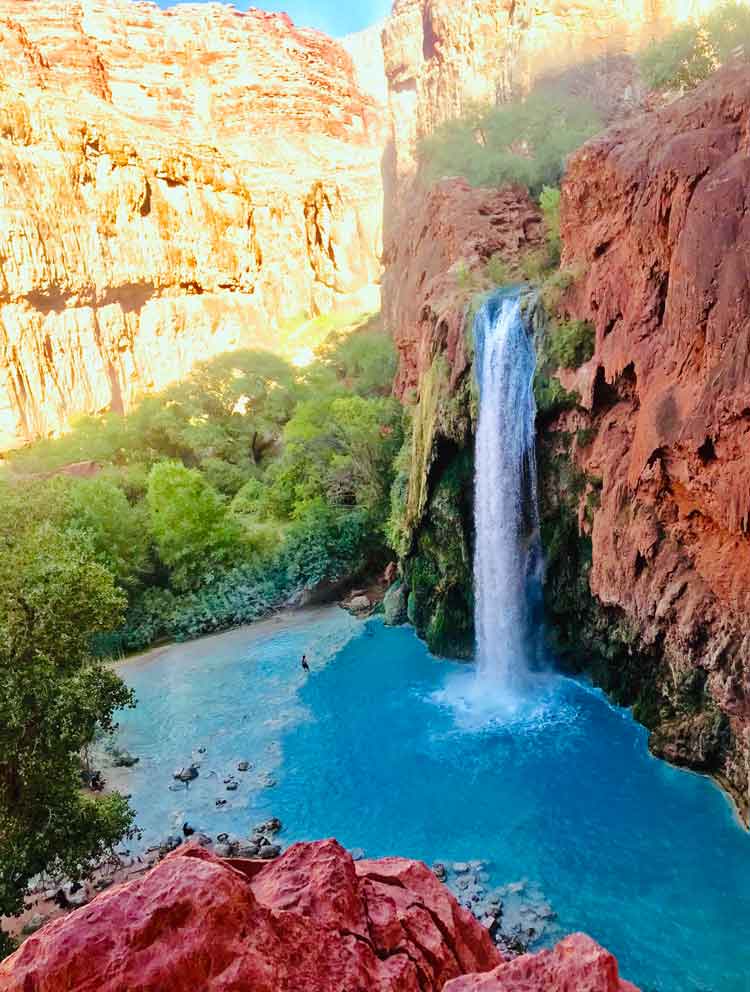 The ultimate guide to the Havasupai Falls hike in Arizona from complete packing list to camping, backpacking, lodge, and photography info. Tips and pictures for how to score a permit, where in the campground to sleep, photo tips, waterfall inspiration, and useful info about the helicopter, food and clothes to bring, and the trail. #pics #havasupai #havasu #waterfalls #arizona #grandcanyon  #waterfall #hiking