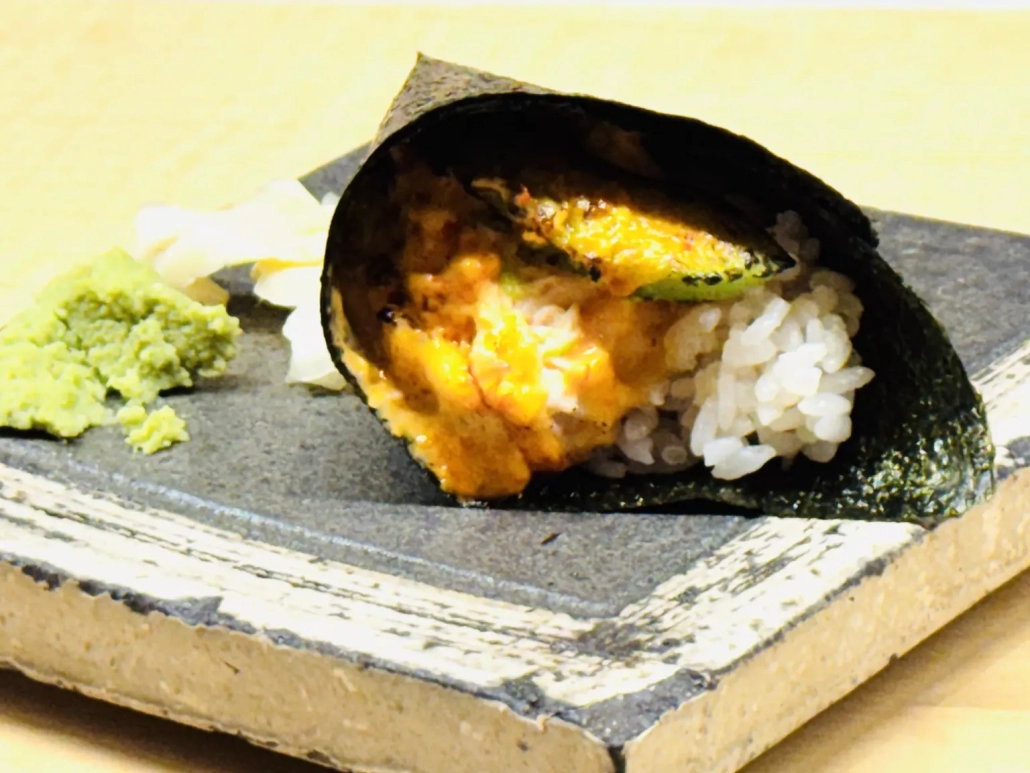 The torched crab handroll at Nori always hits.